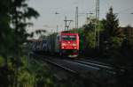 Gut getarnt entstand diese Aufnahme aus einem Busch bei Auerbach an der Bergstrasse. 185 303-5 auf  Achterbahntour . (Mai 2009).