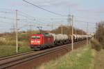 185 278-9 fhrt mit einem Kesselwagenzug in Richtung Braunschweig, fotografiert am 16.04.2010 in Magdeburg Diesdorf.