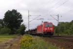 185 334-7 mit einem leeren Autotransportzug in Halstenbek am 29.07.2011