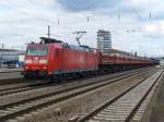 185 095-7 zieht einen Leeren Schotterwagenzug am 22.09.2011 durch Kaiserslautern Hbf    