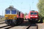 247 046 dahinter 247 057 und 185 011 genossen den sonnigen Samstag in der Sonne, hier auf den Abstellgleisen des Bahnhof Freilassing. Das Foto entstand vom ffentlichen Bahnhofsparkplatz; am 01.10.2011