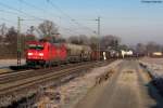 Die 185 305-0 mit einem gemischten Gterzug bei Helmsheim. Aufgenommen am 21.02.2012.