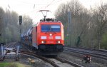 185 362-1 DB kommt mit einem Kalkzug von Hermalle-Huy(B) nach Oberhausen fährt durch Kohlscheid  in Richtung Herzogenrath bei Abendsonne am 29.3.2012.