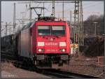 Die 185 238-3 bei der Ausfahrt aus Aachen West im Mrz 2012.  
Am Haken ein gemischter Gterzug.