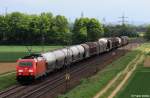 DB 185 318-3 (ohne Logo) vor Gterzug Richtung Regensburg, KBS 880 Passau - Nrnberg, fotografiert bei Radldorf am 07.05.2012 --> im Hintergrund die Trme der Stadt Straubing 