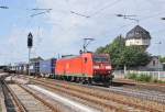 185 064 ist mit Containern auf der Main-Neckar-Bahn unterwegs in Richtung Darmstadt.Aufgenommen in Weinheim-Bergstrae am 16.6.2012