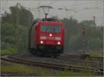 Die 185 276-3 bei strmenden Regen unterwegs auf der KBS 480.Am Haken ein Erzzug.
Location:Eschweiler/Juni 2012.