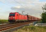 Aus Nievenheimer Richtung kommend an der K33 Brcke ist die 185 346-4 mit einem Leerzug nach Neuss bei Allerheiligen zu sehen. 10.10.2012