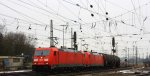 185 355-5 und 185 359-7 beide von der DB fahren mit einem langen lzug aus Antwerpen-Petrol(B) nach Basel(CH) bei der Abfahrt aus Aachen-West und fahren in Richtung Aachen-Hbf,Kln bei Wolken am