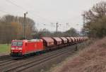 Am 16.April 2013 war 185 049 mit einem Getreidezug in der nrdlichen Ausfahrt des Bahnhofs Elze (KBS 350) auf dem Weg Richtung Norden.