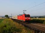 Die 185 044 mit einem Containerzug am 06.07.2013 unterwegs bei Himmelstadt.