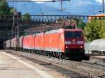 DB - Loks 185 097-3 und 185 098-1 und 185 137-7 vor Gterzug bei der durchfahrt im Bahnhof Bellinzona am 18.09.2013