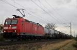 Am 08.11.2013 fuhr 185 030-4 mit dem gemischten Kesselzug von Mullhouse (F) nach Offenburg Gbf nrdlich von Mllheim (Baden) bei Hgelheim gen Freiburg.