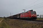 Am 03.01.2014 bespannte die Mannheimer 185 128-6 eine Stahlzug, als sie nördlich von Müllheim (Baden) an Hügelheim gen Freiburg vorbeifuhr.