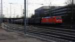 185 280-5 von Railion kommt aus Richtung Köln,Aachen-Hbf mit einem Kurzen Coilzug aus Linz-Voestalpine(A) nach Genk-Goederen(B) und fährt in Aachen-West ein bei Sonne am 18.1.2014.
