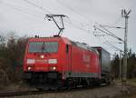 185 281-3 mit KLV Zug 43761 von Rostock Seehafen nach Novara bei der Durchfahrt um 13:44 Uhr in der Gterumfahrung in Hhe Rostock Hbf 
