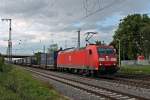 Am 28.05.2014 durchfuhr die Mannheimer 185 067-6 mit einem Containerzug den nördlichen Bahnhofsbereich von Müllheim (Baden) gen Schweiz.