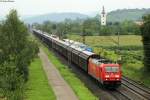 185 288-8 mit einem Güterzug bei starken Regen Richtung Süden bei Denzlingen, 26.07.2014.