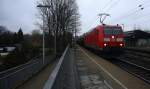 185 159-1 DB  mit einem langen Kesselzug durch Kohlscheid aus Burghausen-Wackerwerk nach Antwerpen-Noord(B) und kommt die Kohlscheider-Rampe hoch nach Aachen-West. Bei Regenwolken am Kalten Morgen vom 27.2.2015.