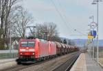 185 003-1 mit einem gemischten Güterzug Richtung Nürnberg bei Pölling, 03.03.2014