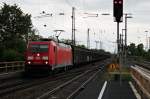 Am 25.04.2014 bespannte die Mannheimer 185 382-9 einen Redbullzug aus Bludenz von Muttenz bis nach Bremerhaven. Hier ist sie bei der Durchfahrt in Müllheim (Baden).