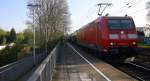 185 012-2 DB mit einem langen Kesselzug durch Kohlscheid aus Burghausen-Wackerwerk nach Antwerpen-Noord(B) und kommt die Kohlscheider-Rampe hoch nach Aachen-West.