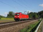 Die 185 236 mit einem Stahlzug am 10.05.2015 unterwegs bei Einöd.