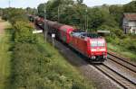 Mit einem gemischten Güterzug am 22.08.2014 fuhr DBSR 185 124-5 südlich von Müllheim (Baden) am Fotografen vorbei in Richtung Süden.