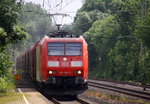 185 180-7 DB  kommt aus Richtung Aachen-West,Laurensberg,Richterich und fährt durch Kohlscheid in Richtung Herzogenrath,Hofstadt,Finkenrath,Rimburg,Übach-Palenberg,Zweibrüggen,Frelenberg,Geilenkirchen,Süggerrath,Lindern,Brachelen,Hückelhoven-Baal,Baal,Erkelenz,Herrath,Beckrath,Wickrath mit einem Güterzug aus Belgien nach Neuss.
Aufgenommen von Bahnsteig 1 in Kohlscheid.
Bei Sonnenschein am Nachmittag vom  13.6.2016.