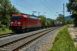 185 317-5 von Gemünden/Main komment ist hier mit einen Aufliegerzug bei Rieneck am 07.06.16 zu sehen.