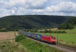 185 009-8 zieht am 11.August 2016 einen LKW-Walter KLV bei Gambach in Richtung Wrzburg.