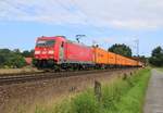 185 330-5 mit Containerzug in Fahrtrichtung Nienburg(Weser). Aufgenommen am 22.07.2015 bei Eystrup.