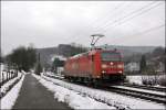 185 165 hat ihren Gterzug nach Kreuztal gebracht und ist nun auf dem Weg nach Lennestadt.