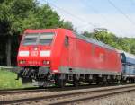 185 073-4 steht am 24. Juni 2012 mit dem PKP-Cargo Kohlezug am Esig von Kronach.