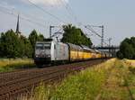 Die 185 538 mit einem Autozug am 06.07.2013 unterwegs bei Thüngersheim.