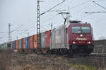 Die 185 632-7 nun im neuen Farbkleid der Emons Rail Cargo unterwegs, kommend aus Lüneburg. Höhe Bardowick, 26.03.2018