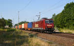 185 513 der Emons führte am 20.07.18 einen Containerzug durch Burgkemnitz Richtung Wittenberg.