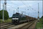 TLX 185 565 mit DGS 48804 bei der Einfahrt Rostock Seehafen am 06.06.09