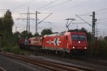 HGK 185 582-4 + DE 64 + DH 57 + DH 711 mit einem Braunstaubkohlezug in Dsseldorf Eller am 12.09.09