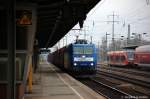 185 510-5 der HLG mit einem leeren Holzzug in Berlin Schnefeld Flughafen in Richtung Grnauer Kreuz. 18.01.2011