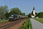 185 572 mit einem Getreidezug am 28.06.2012 unterwegs bei Hausbach.