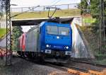 Am Sonntag den 2.9.2012 ist die 185 526-1 mit der 145 015 CL beide in HGK-Diensten, als LZ durch Osterath zu sehen.....sie unterqueren die ehemalige Oberkasseler-Krefelder Eisenbahnstrecke, die heute