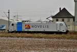 Kurz nach dem die  185 697-0 von Railpool den NOVELIS-Zug aus Northeim in Nievenheim in der Rangiergruppe abgestellt hat, rangiert sie auf ihr Abstellgleis, das sie nur ber das Streckengleis erreichen kann. Samstag den 23.2.2013