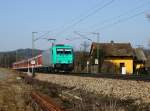 Die 185 634 mit einer S Bahn nach Neumarkt Oberpfalz am 05.03.2011 unterwegs bei Plling.