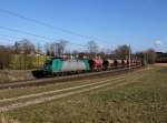 Die 185 517 mit einem Getreidezug am 23.02.2014 unterwegs bei Kimpling.