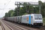 Railpool/Bräunert Transpetrol 185 696 am 8.8.13 mit dem Nievenheimer in Dedensen-Gümmer.