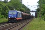 Raildox 185 409-0 durchfährt am 29.05.2014 mit ihrem Zug aus Richtung Lehrte kommend Ahlten.