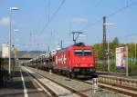 185 587-3 von HGK  MEV  zieht am 03.Oktober 2014 einen ARS-Altmann Autozug durch Karlstadt(Main) Richtung Wrzburg.