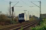 Lz aus Richtung Neuss ist hier die Railpool 185 677-2 auf der Kbs 495 gen Osterath unterwegs am Sonntag den 23.11.2014