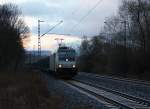 Das letzte Bild vom Jahr 2013 zweigt 185 672-3, die leere Autotransportwagen in Richtung Süden durch Wehretal-Reichensachsen zieht.